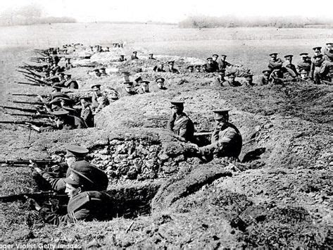 Soldiers training in trench warfare, with well-defined fire bays connected by offset traverse ...