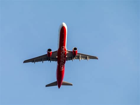 Red plane in the sky free image download