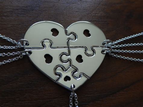 Heart shaped jigsaw puzzles with hearts pendants necklaces