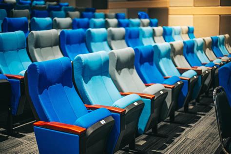 Empty blue cinema seats, chairs. Perspective view 17661383 Stock Photo at Vecteezy