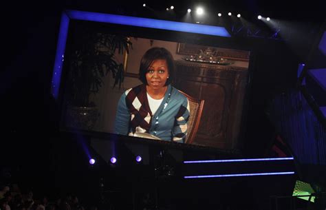 Michelle Obama Repeats Controversial Cardigan At Kids' Choice Awards ...