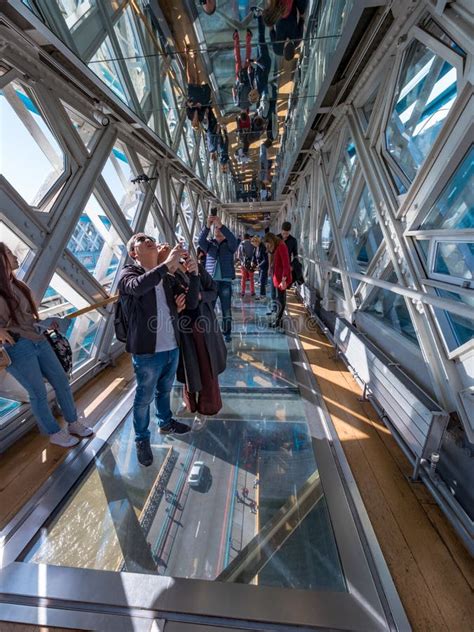 Tourists Visiting the Interior of Tower Bridge with a Glass Floor Over ...