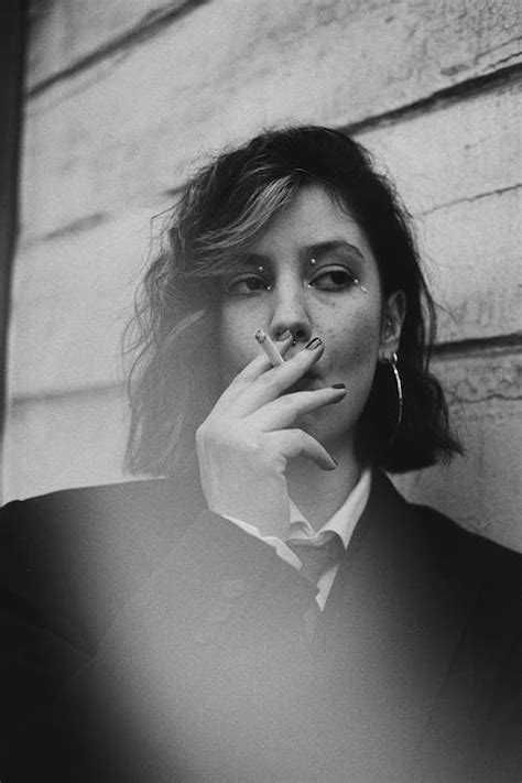 Woman Smoking Cigarette in Black and White · Free Stock Photo