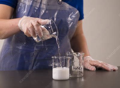 Mixing Sodium Chloride and Silver Nitrate - Stock Image - C036/3666 - Science Photo Library