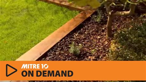 How to Create Wooden Garden Borders | Mitre 10 Easy As | Building a raised garden, Garden edging ...