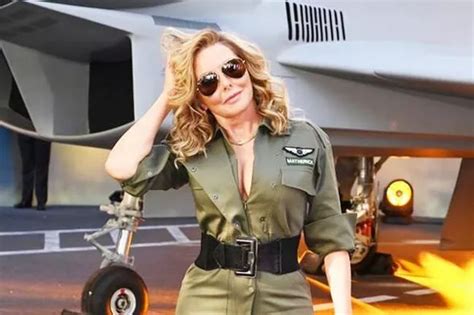 Qualified pilot Carol Vorderman wears full flying gear to Top Gun ...