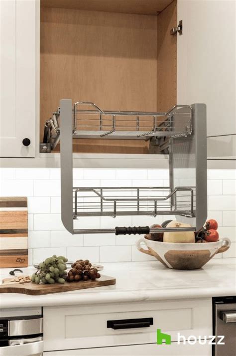 Pull down shelves in the kitchen change EVERYTHING. Adding this to the dream kitchen must-have ...