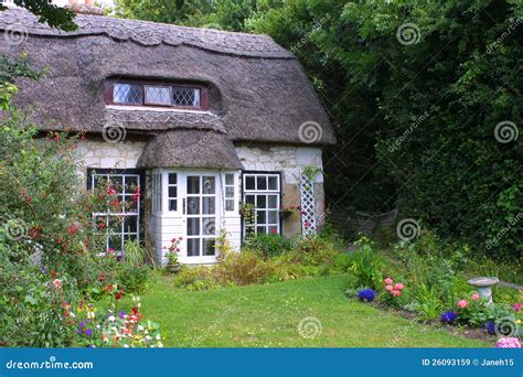 Thatched cottage stock image. Image of charming, house - 26093159