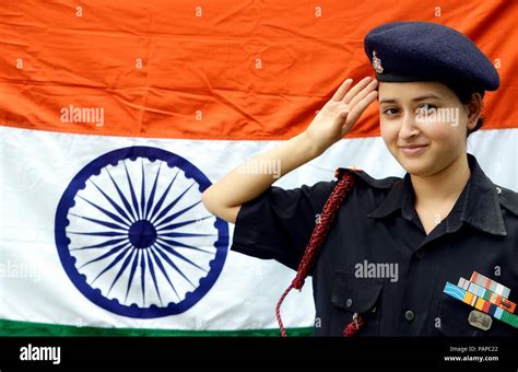 Woman Soldiers Salute the Flag Stock Photo - Alamy