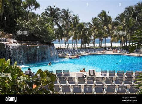 Swimming pool in grounds of Fairmont Acapulco Princess Hotel Stock Photo: 12505667 - Alamy