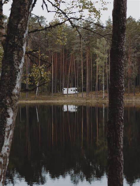 Camper Van Near a Lake · Free Stock Photo