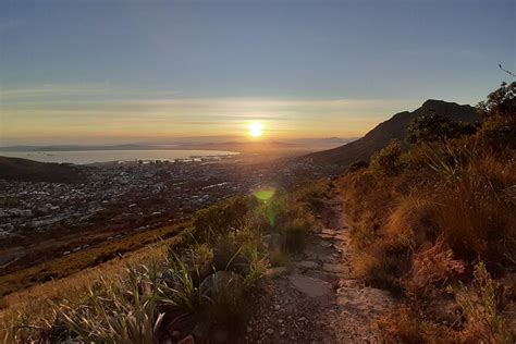 Hike Lion's Head Sunrise morning tour Cape Town | Compare Price 2024