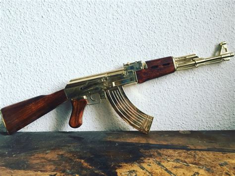 Golden AK47 fixed stock, assault rifle model AK-47