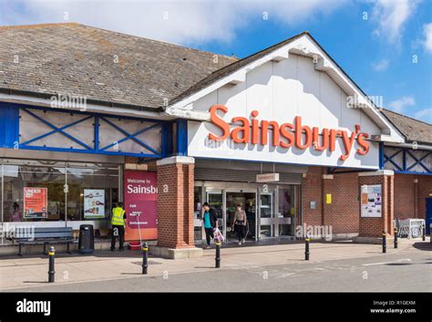 Sainsburys store exterior Sainsburys supermarket with orange sainsburys sign outside logo Great ...