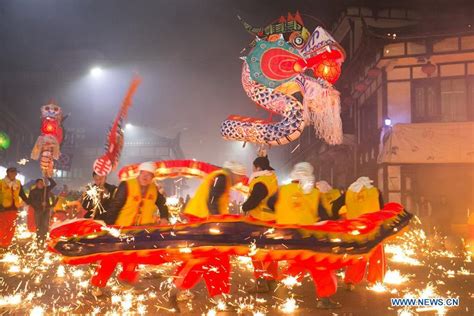 People perform dragon dance to celebrate upcoming Lantern Festival in Guizhou