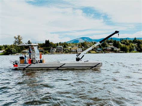 Workskiff | Workskiff builds barge with crane for Boats Lifts International