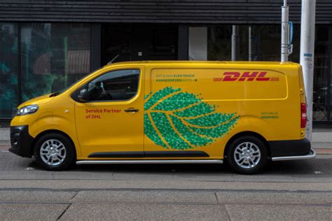 190+ Dhl Truck Delivering Van Stock Photos, Pictures & Royalty-Free ...