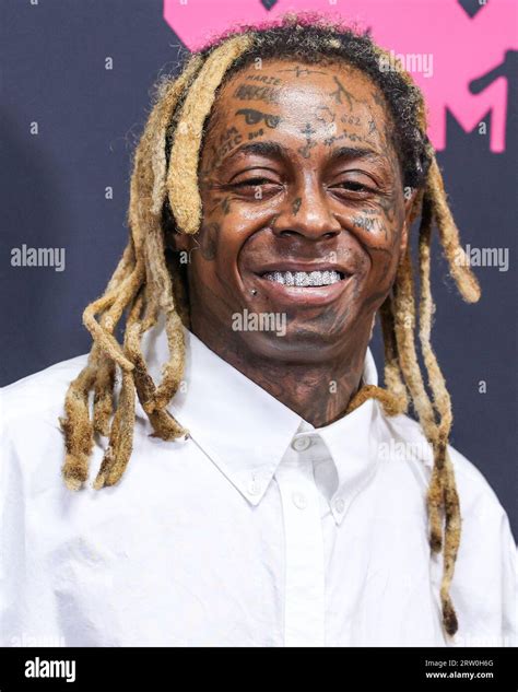 NEWARK, NEW JERSEY, USA - SEPTEMBER 12: Lil Wayne poses in the press ...