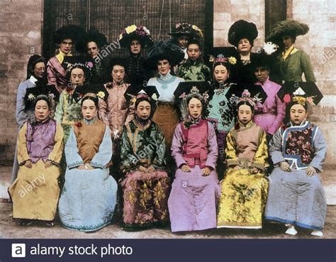 an old photo of people in traditional dress