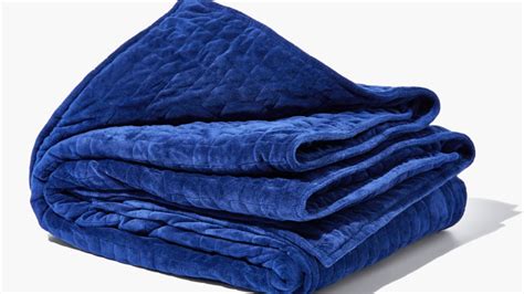 Gravity Cooling Blanket Keeps You Cool as You Sleep | Mental Floss