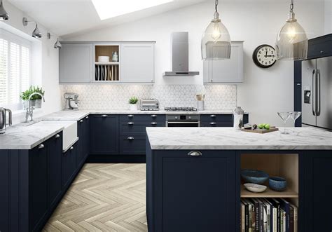 Opting for light wood flooring in a herringbone design tricks the eye in… | Black appliances ...