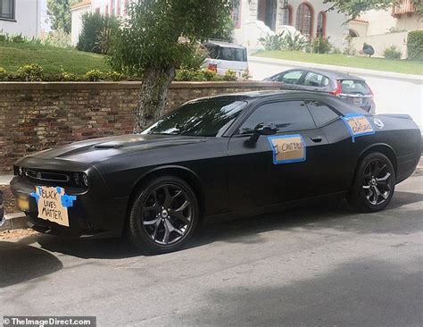 Billie Eilish walks dog by her car with Black Lives Matter messages ...