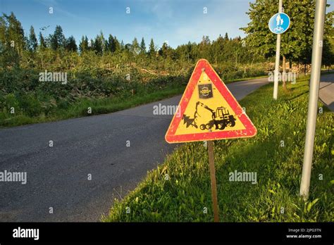 Tree cutting safety sign, Finland Stock Photo - Alamy