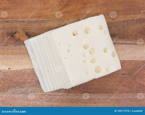 Slices of Low Sodium Swiss Cheese on a Cheese Board Stock Photo - Image of sodium, holes: 108171978