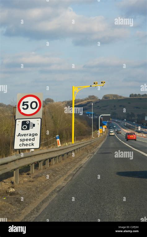 Average speed cameras, average speed check, on the M4 motorway, England, UK Stock Photo - Alamy