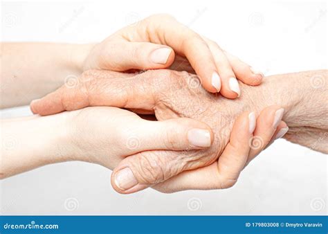 Helping Hand for the Elderly Concept with Young Hands Holding Old Hand Stock Photo - Image of ...