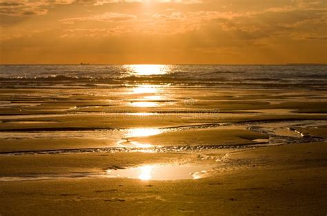 Low tide on the beach stock photo. Image of clouds, high - 5771884