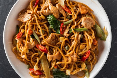 Wok stirfry egg noodles with fried containing asian, background, and beans | Food Images ...