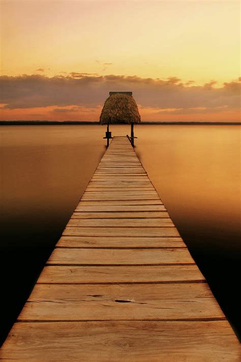 Sunset over Lake Peten Itza - El Remate - Guatemala Photograph by Simon ...