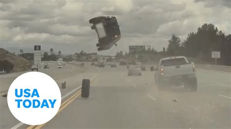 Car flips after being hit by a loose tire on a Los Angeles freeway | USA TODAY - YouTube