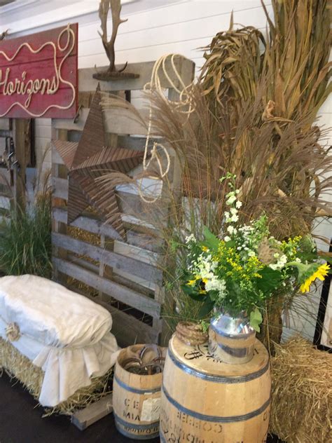 country western party; pallet backdrop, rope sign; draped-hay bale seating; barrels; by Two ...