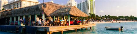 Bugaloe Beach Bar & Grill | Beach bars, Palm beach aruba, Beach