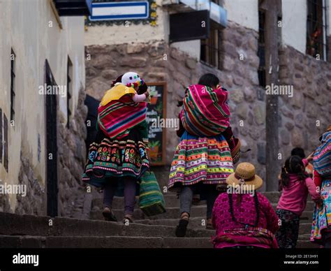 Indigenous quechua people women family in traditional colorful ...