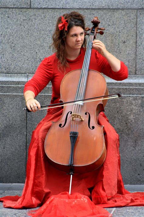 busker in red | Street musician, Street performance, Musician