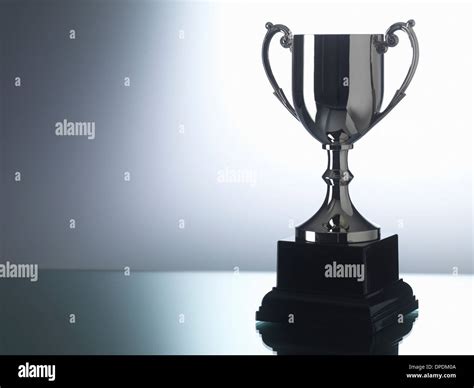 Trophy against black and white background Stock Photo - Alamy