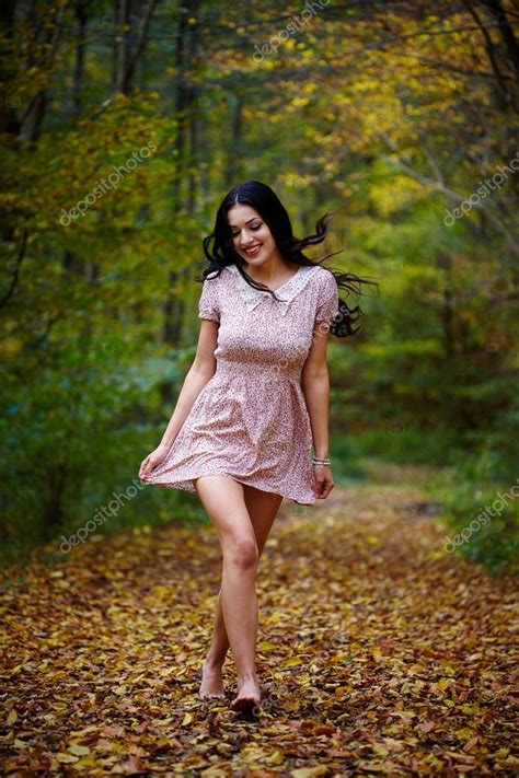 Barefoot woman in the forest — Stock Photo © Xalanx #57572807