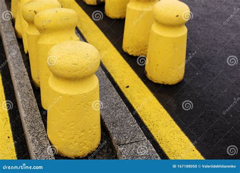 Round Concrete Bollards at a Parking Lot Stock Photo - Image of closed ...