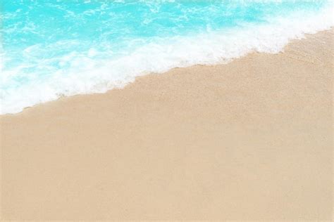 Premium Photo | Empty beach background Sand and blue sea with copy space