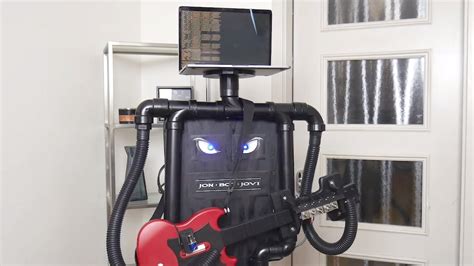 Engineer Builds a Robot That Plays 'Guitar Hero' Solos