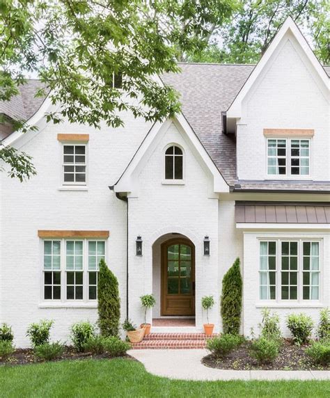 Absolutely loving the exterior details of this white brick home, don’t you? To see a glimpse ...