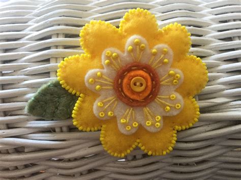 LYNN: Brooch. Flower. Felt. Bright sunny yellow and white. Embellished & edged w/seed beads ...