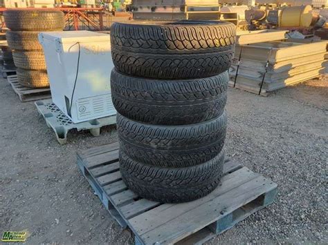 Yokohama 275/45R20 Tires on Rims - Michener Allen Auctioneering Ltd