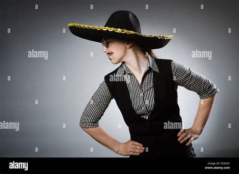 Person wearing sombrero hat in funny concept Stock Photo - Alamy