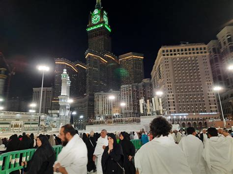 Mecca, Saudi Arabia, April 2023 - A beautiful view of pilgrims, tall buildings and lights at ...