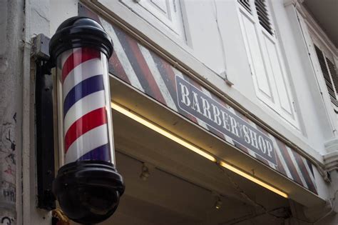 Download Barber Pole Beside Shop Wallpaper | Wallpapers.com