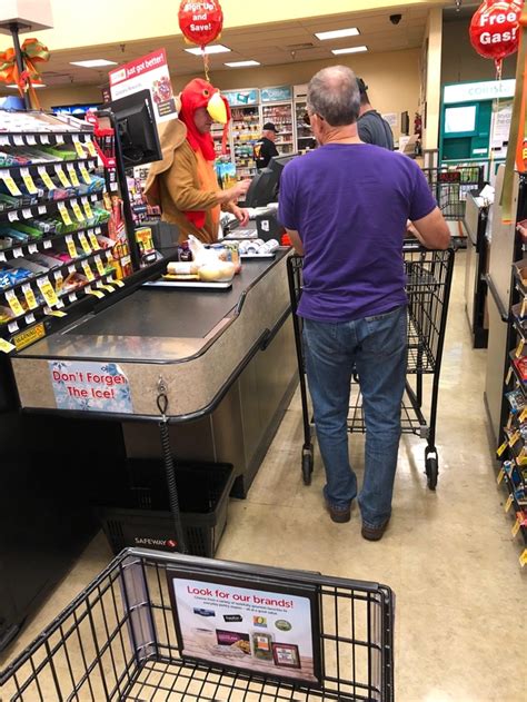 This cashier dressed as a turkey has been gobbling over the intercom every few minutes - Meme Guy